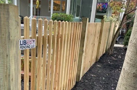 Wooden fence surrounding home